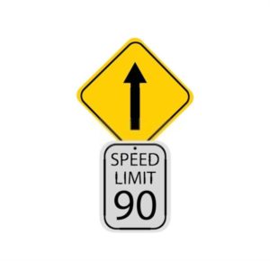 A speed limit board with arrow